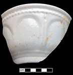 Bowl with arched motif. Arches, scallops, loops and lobes, used in conjunction with vertical panels, became common on white granite in the 1850s (Wetherbee 1996:81). 18BC56